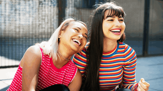 2 girls laughing 