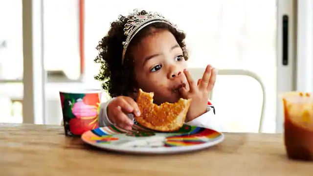 Child Eating Healthy Snack