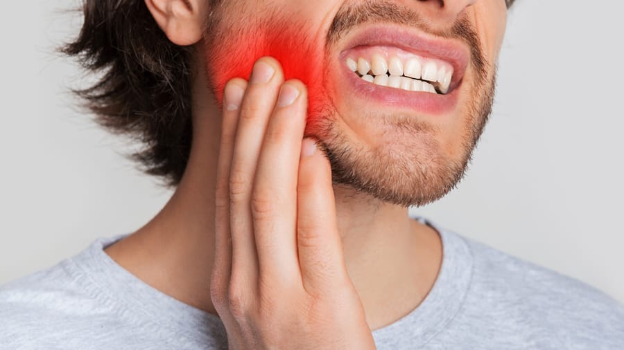 How to cure sore gums?