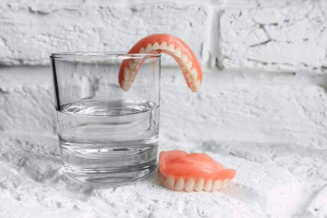 how to clean dentures to avoid bacteria build-up - colgate india