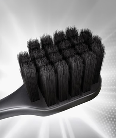 Cepillo Dental Colgate® Pro Cuidado Charcoal con cabeza amplia para mayor cobertura