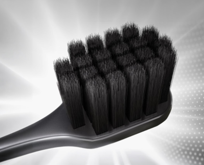 Cepillo Dental Colgate® Pro Cuidado Charcoal con cabeza amplia para mayor cobertura