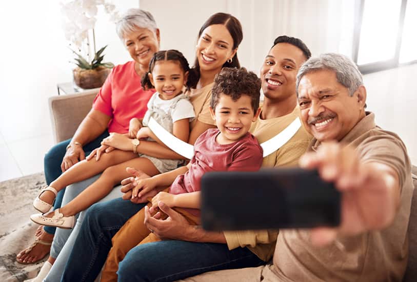 smiling family taking a selfie