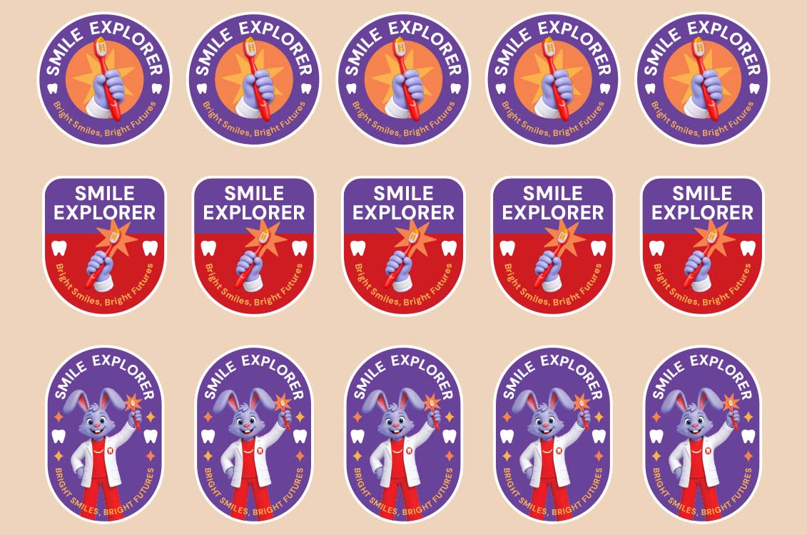 Colgate BSBF Smile Explorer printable badges sheet featuring toothbrush graphics and Dr. Rabbit to reward kids' participation.