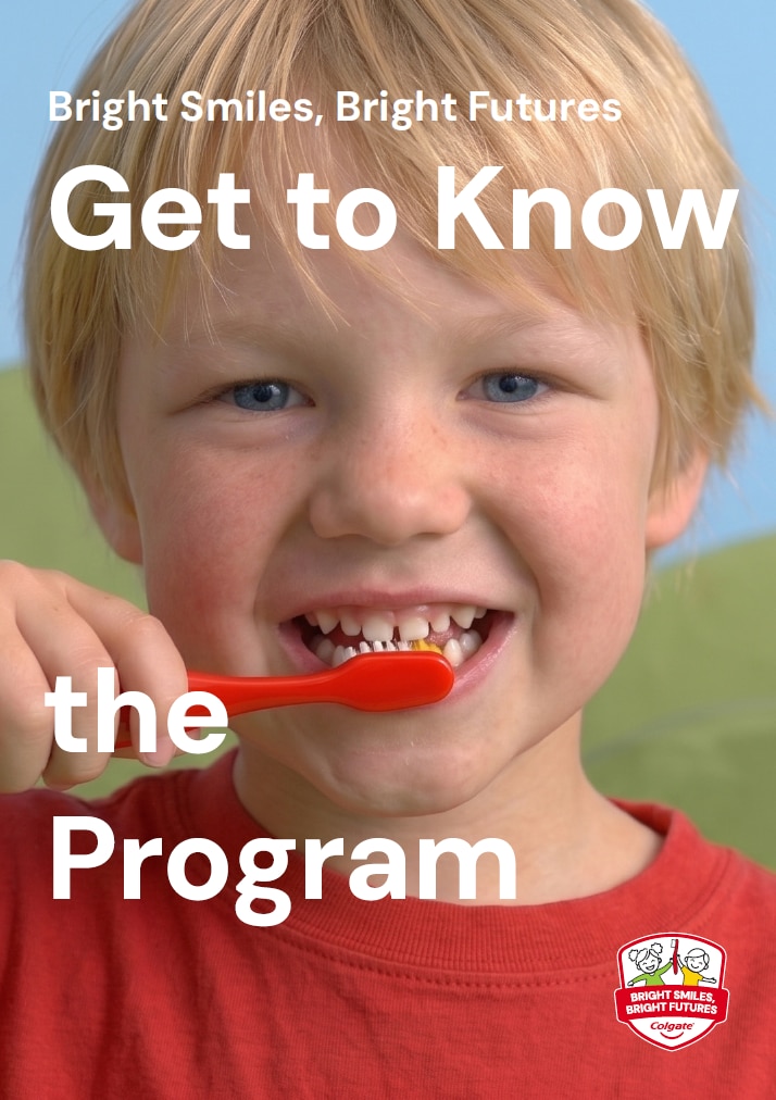 Young blonde boy brushing teeth with a red toothbrush for Bright Smiles Bright Futures oral care program