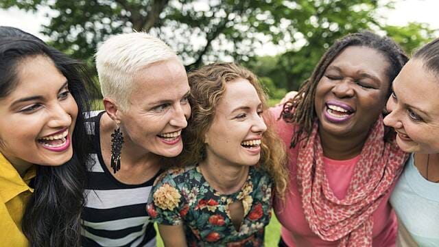 Women laughing after root canal surgery