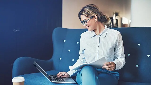 woman reading about root canal infections