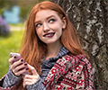 Woman Reading up on Lip Biting