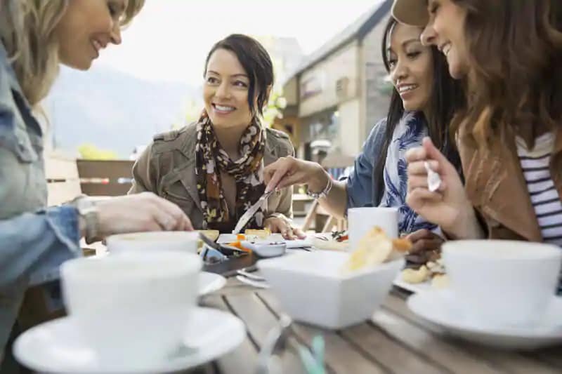 women eating teeth friendly food