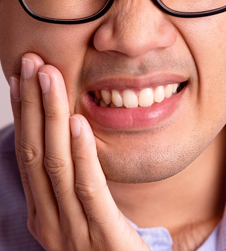 Man with pain on his teeth