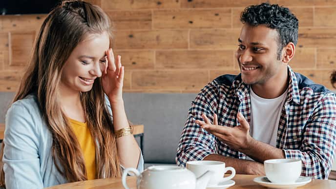 young man talking to a woman