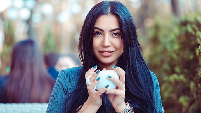 Woman having coffee