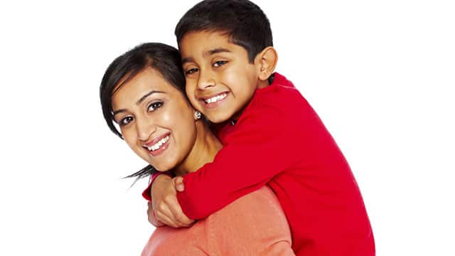 Mother and son smiling
