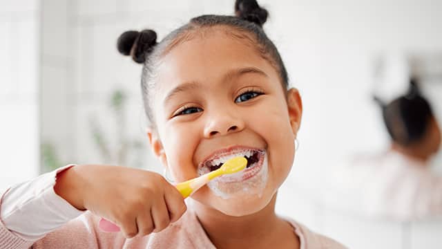What causes bleeding gums in children?