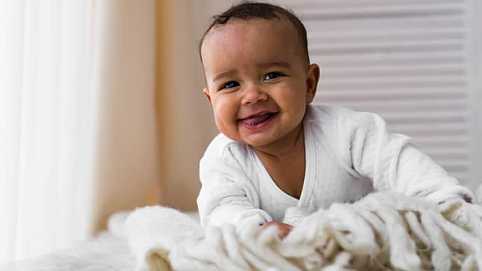 A toddler with baby teething symptoms