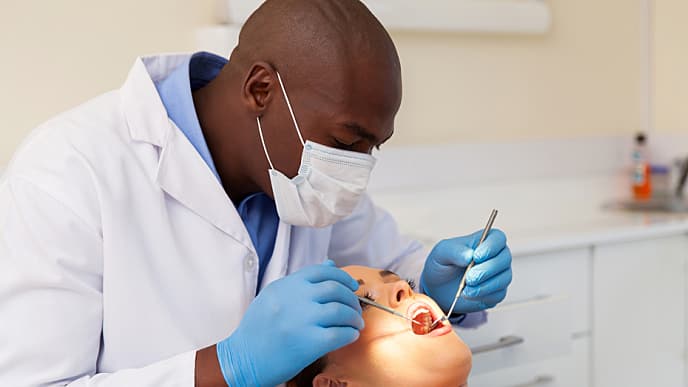 Dentist with patient