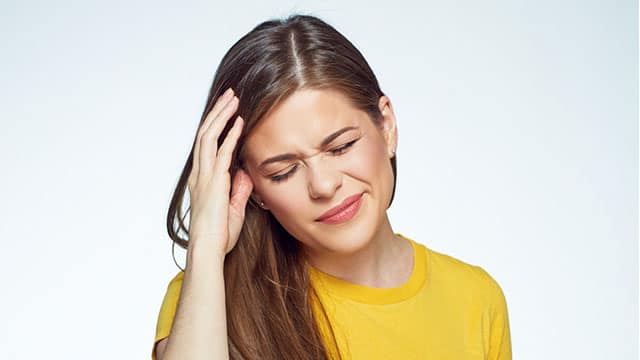 A woman having a headache