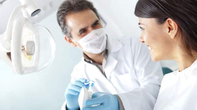 dentist and patient in office