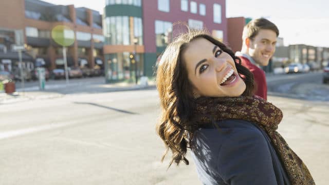 Two people laughing