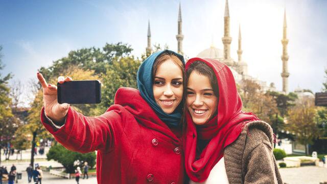 Two friends taking a photo