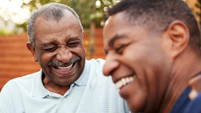 A father smiling with his son