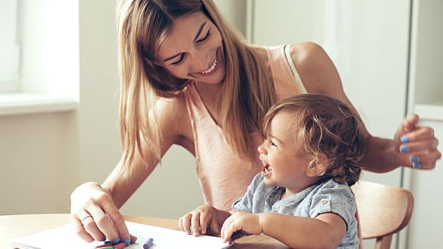 mother and child smiling