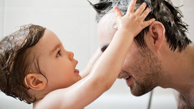 A father and a child in the bathroom