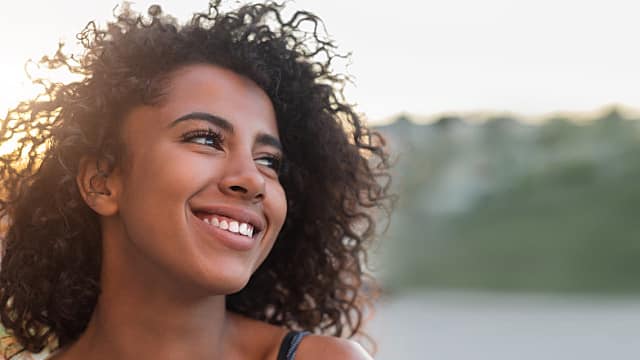 Outdoor portrait of smiling african american girl