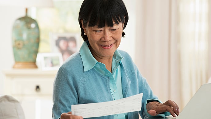 woman reading a letter