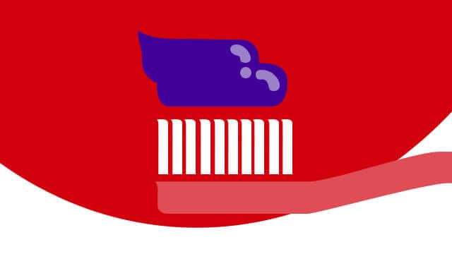 Close-up of Colgate Optic White Purple Toothpaste on a toothbrush
