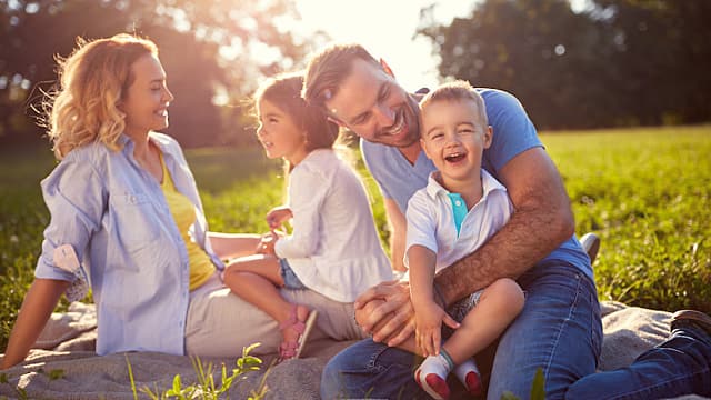 Family resting in the countryside