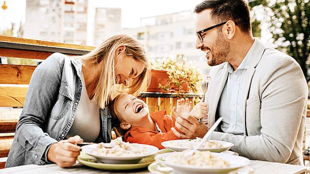 Family enjoying restaurant