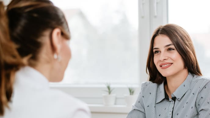 patient talking to dentist
