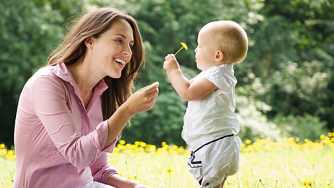young mother with her baby in the park