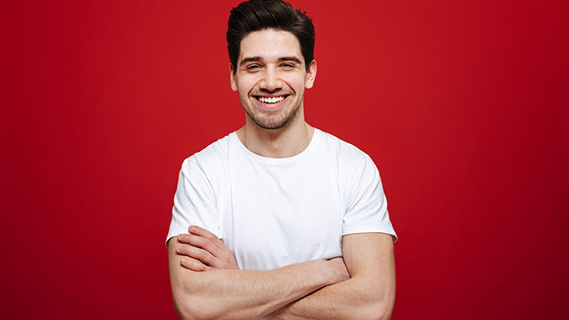 A young man smiling