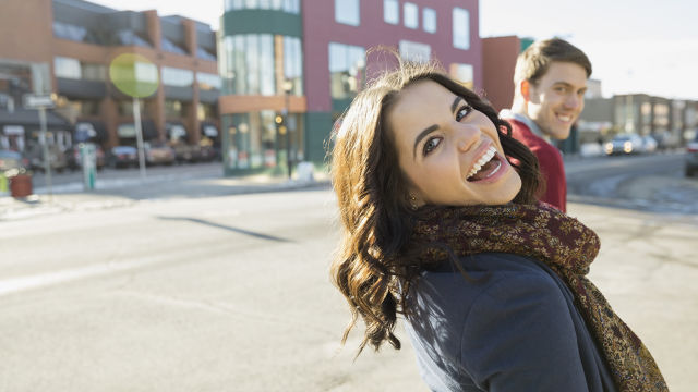 Two people laughing