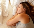 Woman sleeping in bed