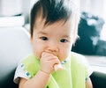 A close up of the toddler indoors