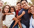 Big family smiling outside