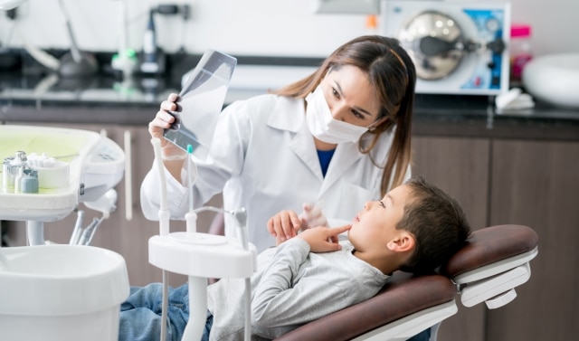 Kid at dentist