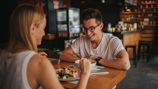 Couple eating in restaurant
