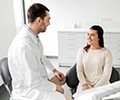 dentist and patient talking