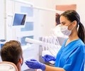 dentist discussing swollen soft palate with patient