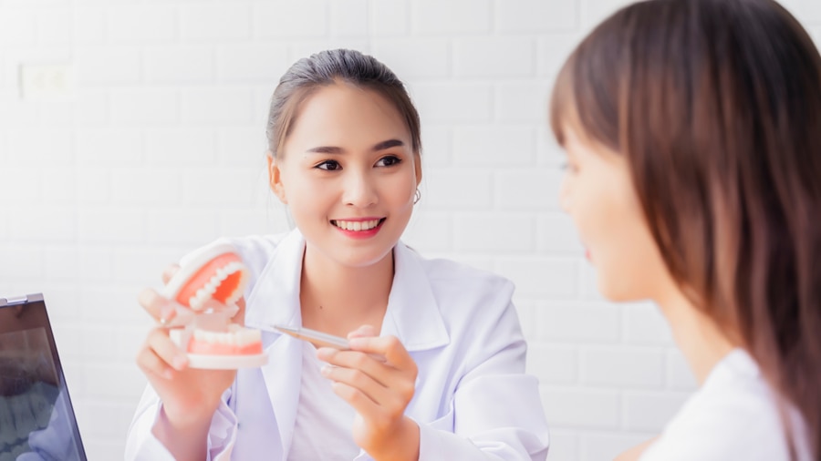 asian-woman-dentist-showing-on-jaw