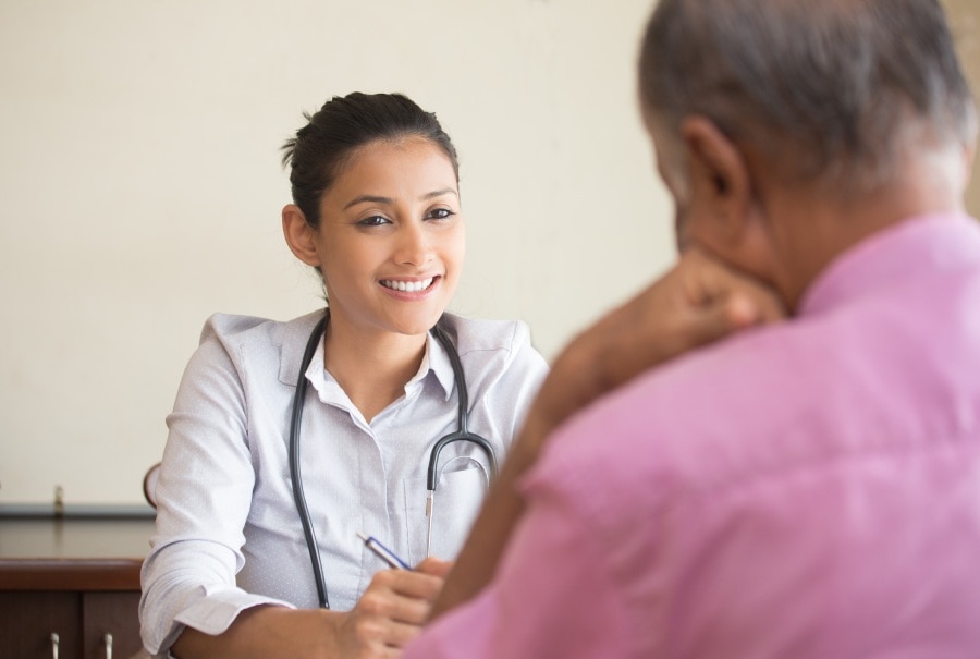 A doctor describing about tooth sensitive treatment