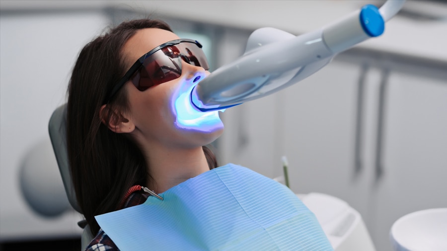 Woman receiving treatment at the dentist