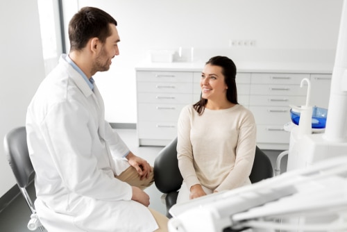 dentist and patient talking