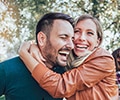 Women and men smiling