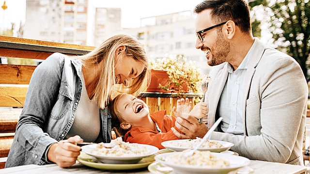 Family enjoying restaurant