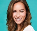 A young woman smiling